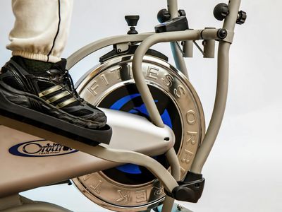 High-end exercise equipment close up in a modern dark gym.